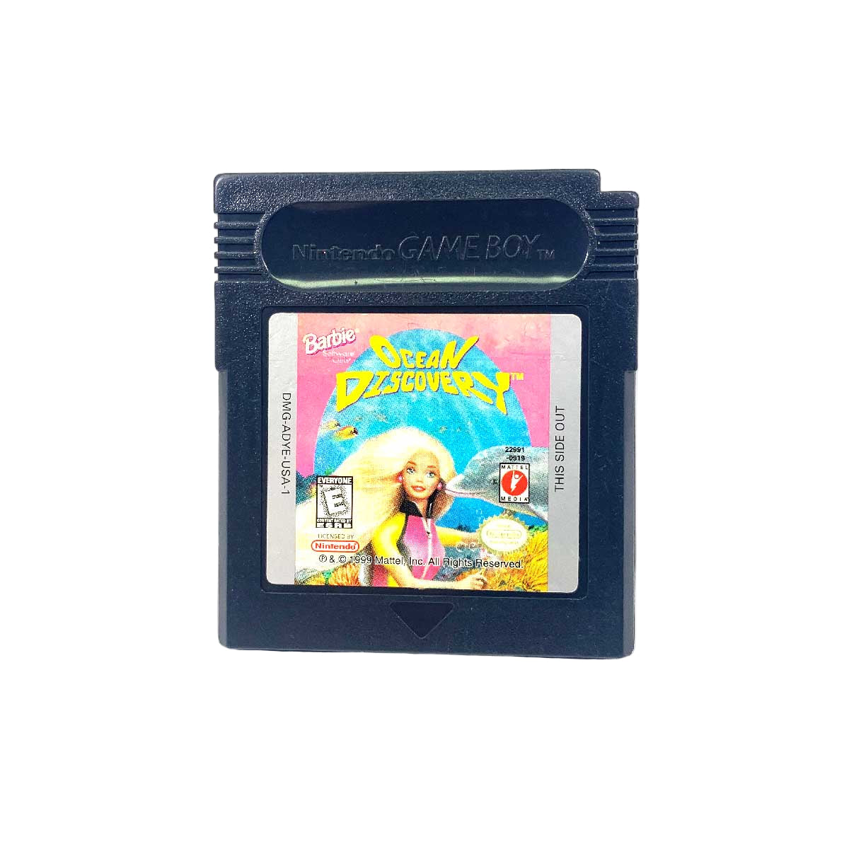 A Barbie-branded Game Boy Color game cartridge, with the cover featuring an illustration of Barbie in an ocean setting.