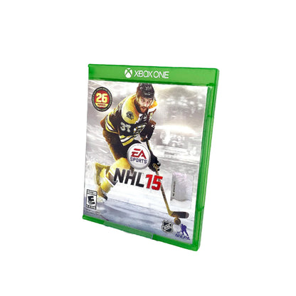 A copy of the video game 'NHL 15' for Xbox One, with the cover featuring an image of a hockey player.